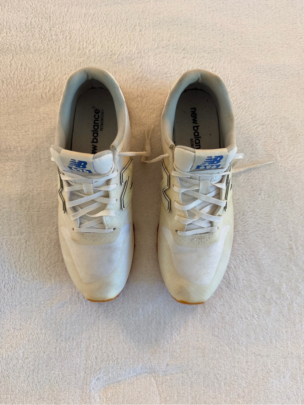New Balance Women’s Off-White Sneakers with Blue Logo